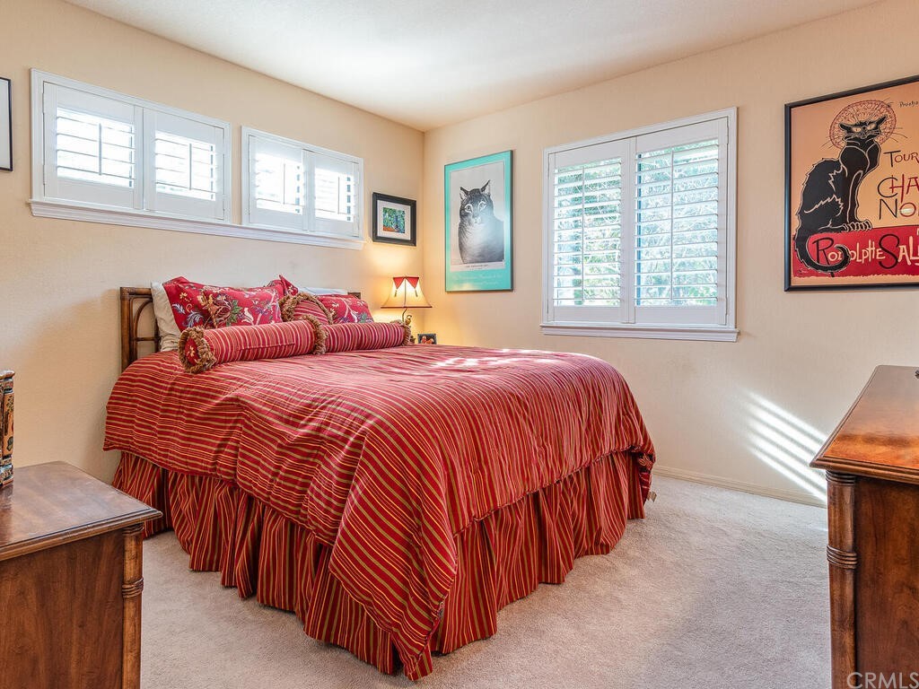 2715 Thoroughbred Place Arroyo Grande, CA 93420 - Photo 19 of 35 a bedroom with a bed and window