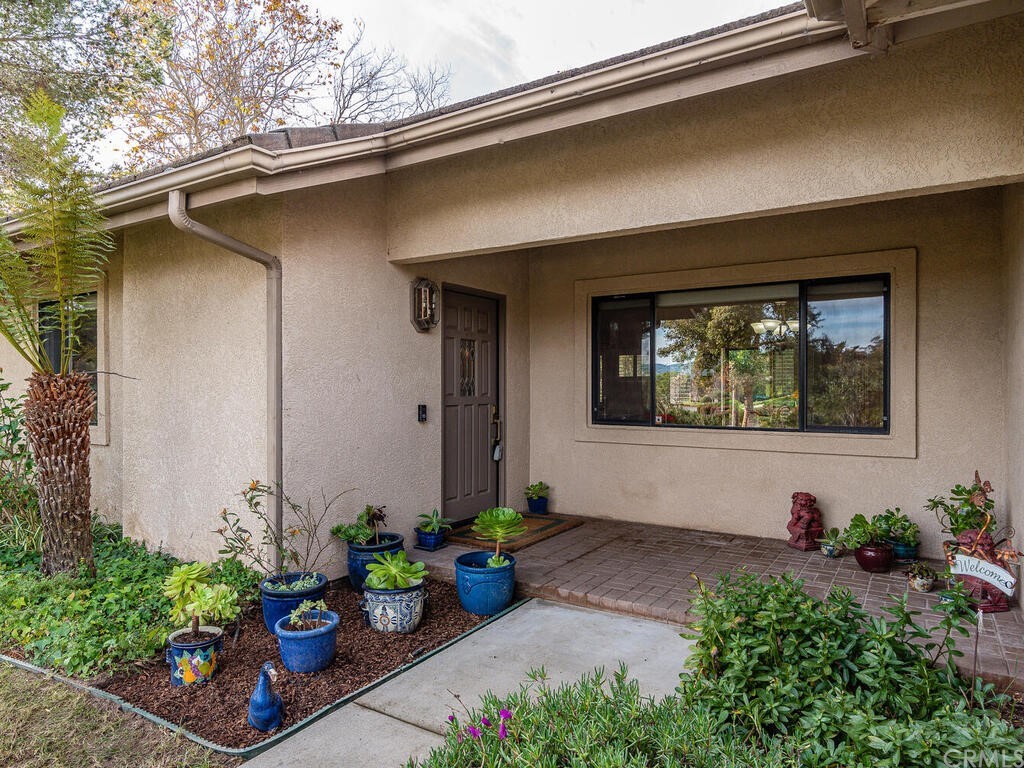 2715 Thoroughbred Place Arroyo Grande, CA 93420 - Photo 5 of 35 a front view of a house with yard