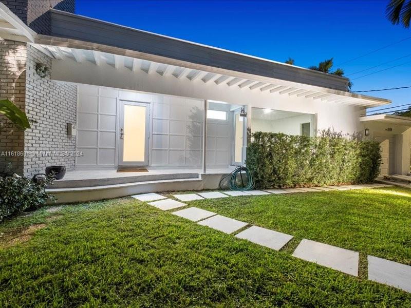 a view of a porch with a backyard