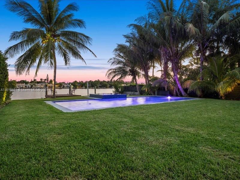 900 88th Street Surfside, FL 33154 - Photo 12 of 60 a view of outdoor space with garden