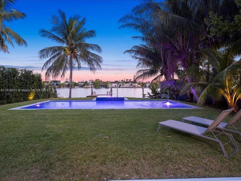 900 88th Street Surfside, FL 33154 - Photo 13 of 60 a view of backyard with swimming pool