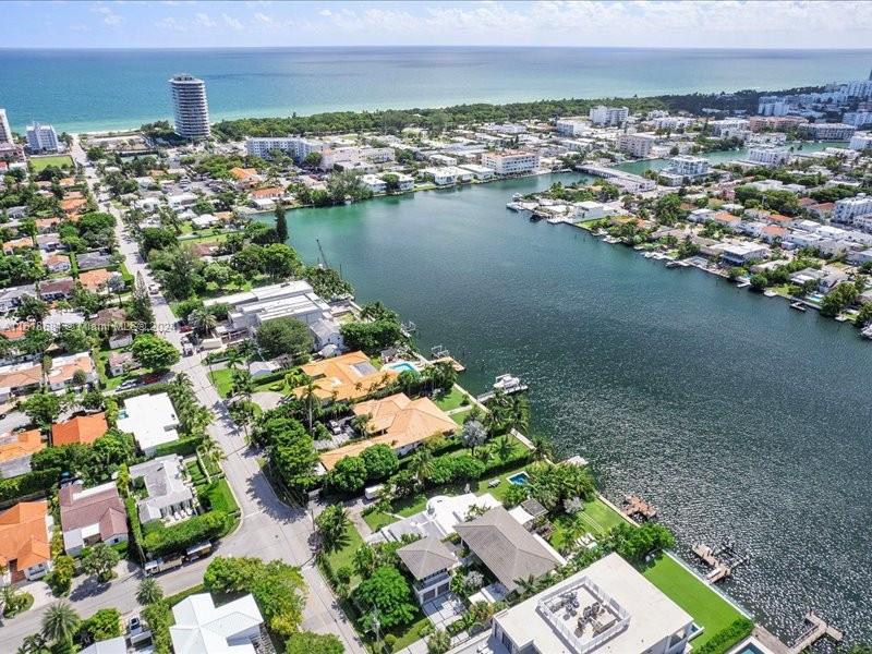 900 88th Street Surfside, FL 33154 - Photo 19 of 60 an aerial view of a house with a lake view