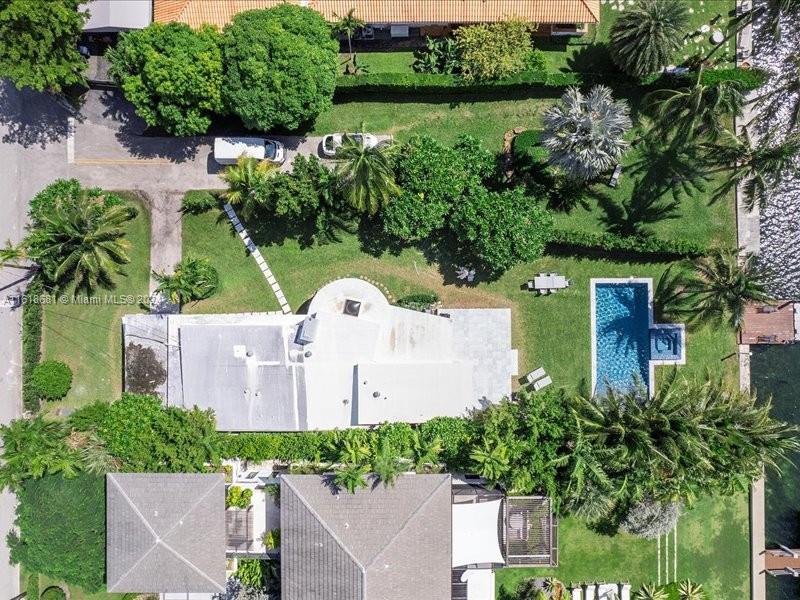 900 88th Street Surfside, FL 33154 - Photo 21 of 60 an aerial view of a house with outdoor space and street view