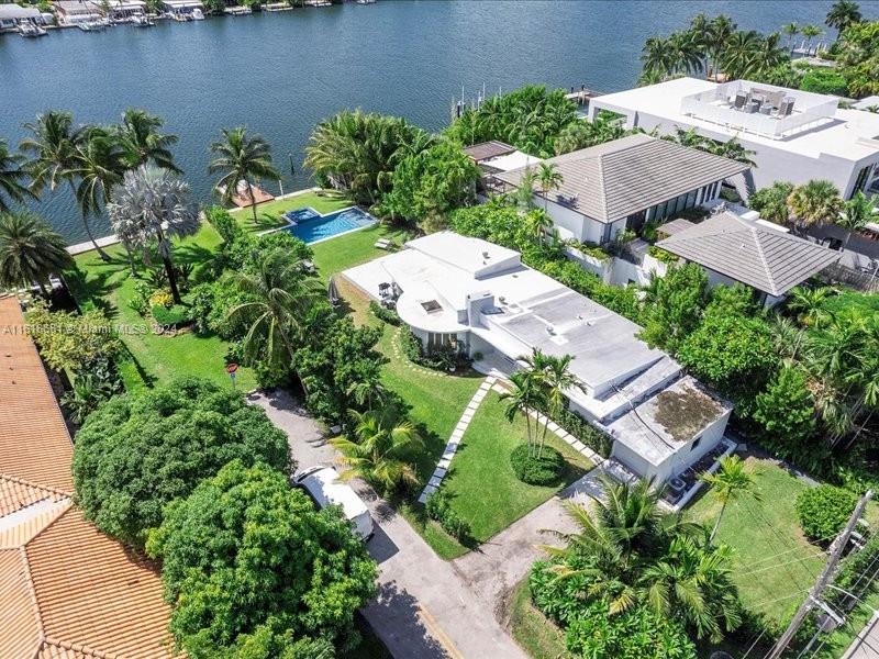 900 88th Street Surfside, FL 33154 - Photo 23 of 60 an aerial view of a house with a lake view
