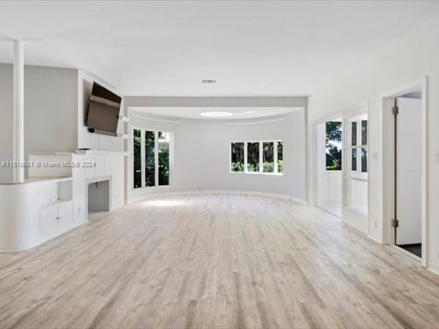 900 88th Street Surfside, FL 33154 - Photo 42 of 60 a view of a kitchen with a sink and a refrigerator