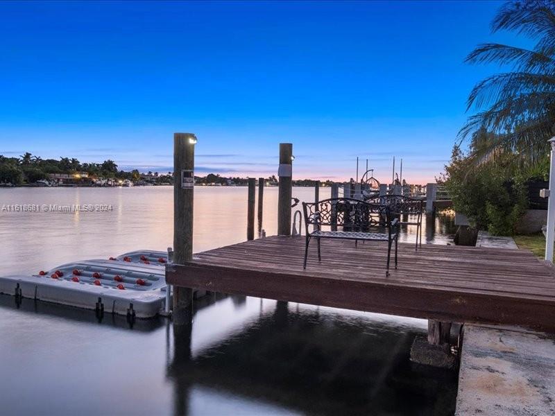 900 88th Street Surfside, FL 33154 - Photo 10 of 60 a view of a balcony with chairs