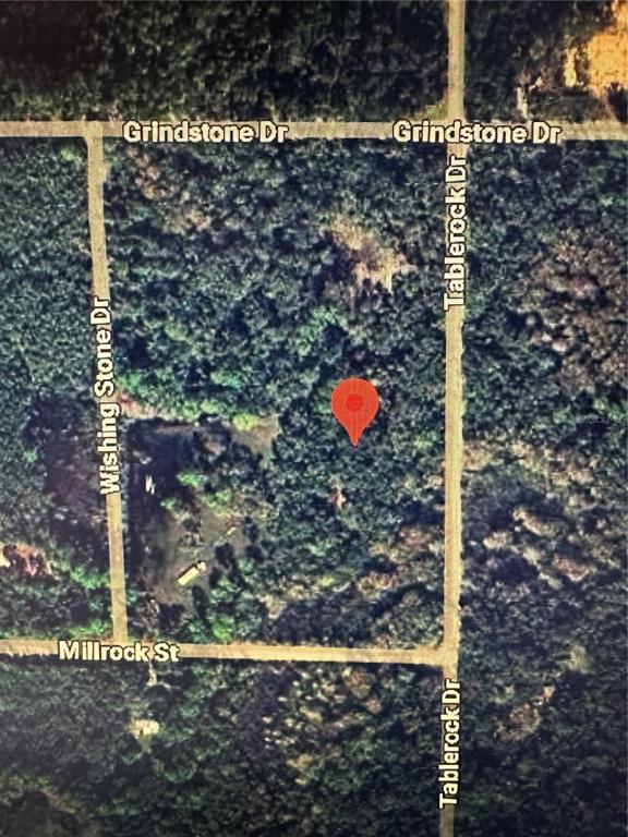 Table Rock Drive Webster, FL 33597 - Photo 7 of 10 a view of a wooden door