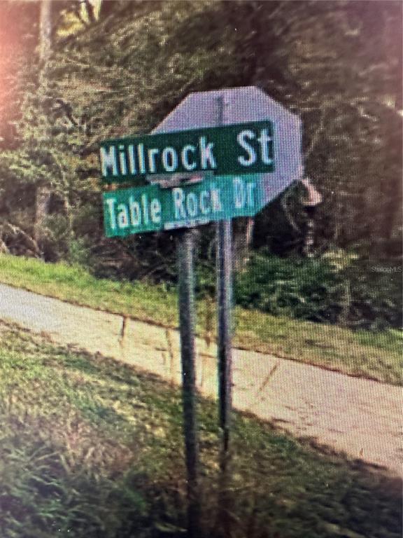 Table Rock Drive Webster, FL 33597 - Photo 10 of 10 a view of a wooden house with large trees