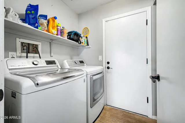 a utility room with dryer and washer