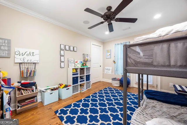 a bathroom with a shower sink and mirror