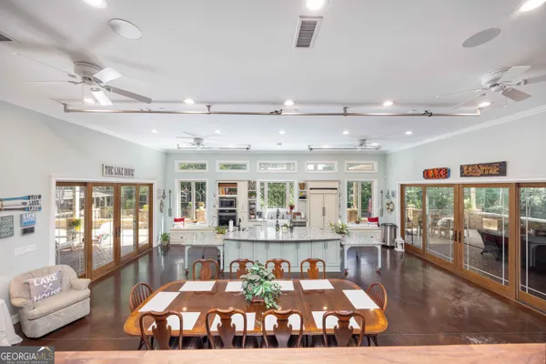 a living room with fireplace furniture and a flat screen tv