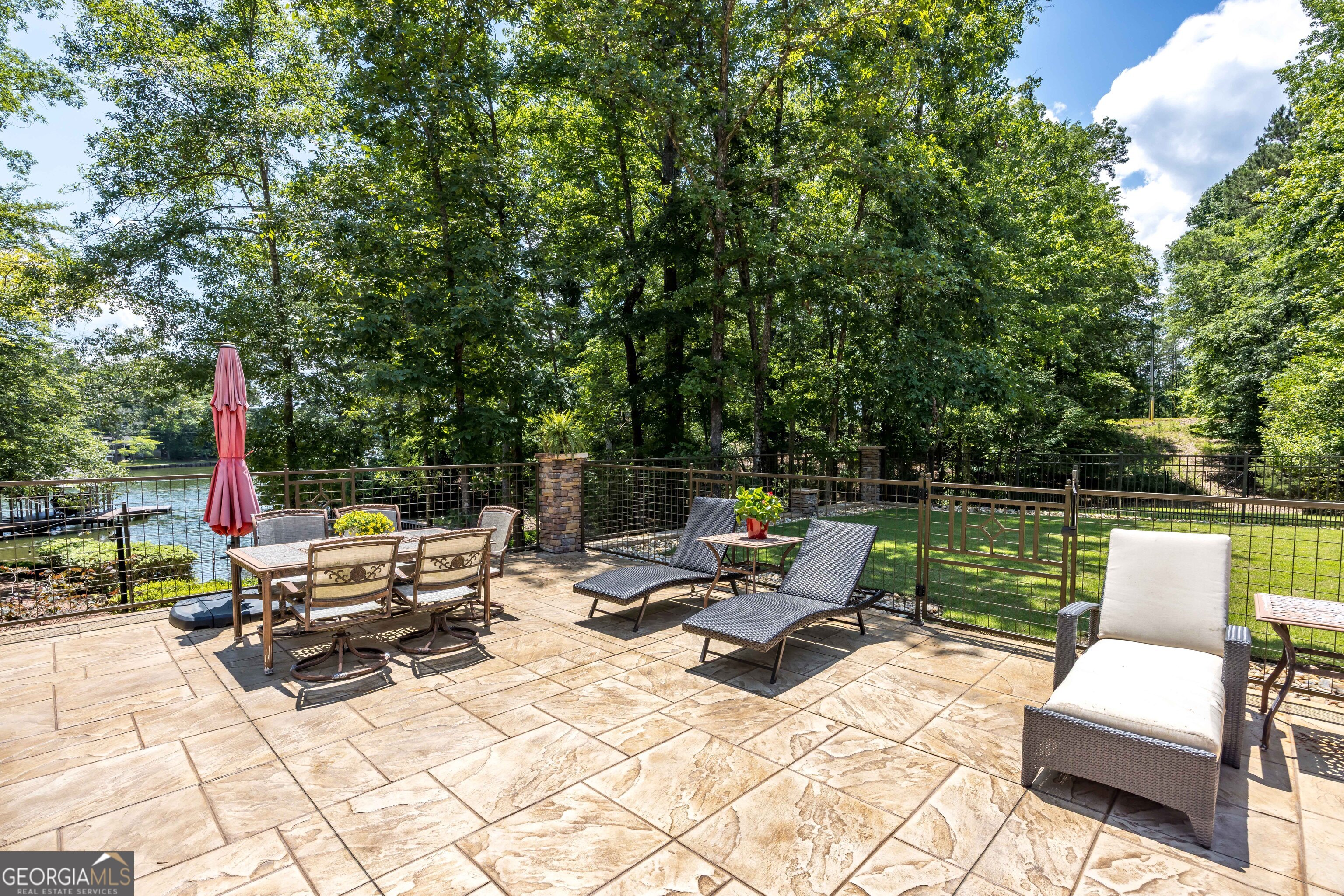 1132 Boat Club Road Hamilton, GA 31811 - Photo 40 of 50 a view of backyard with seating area and trees