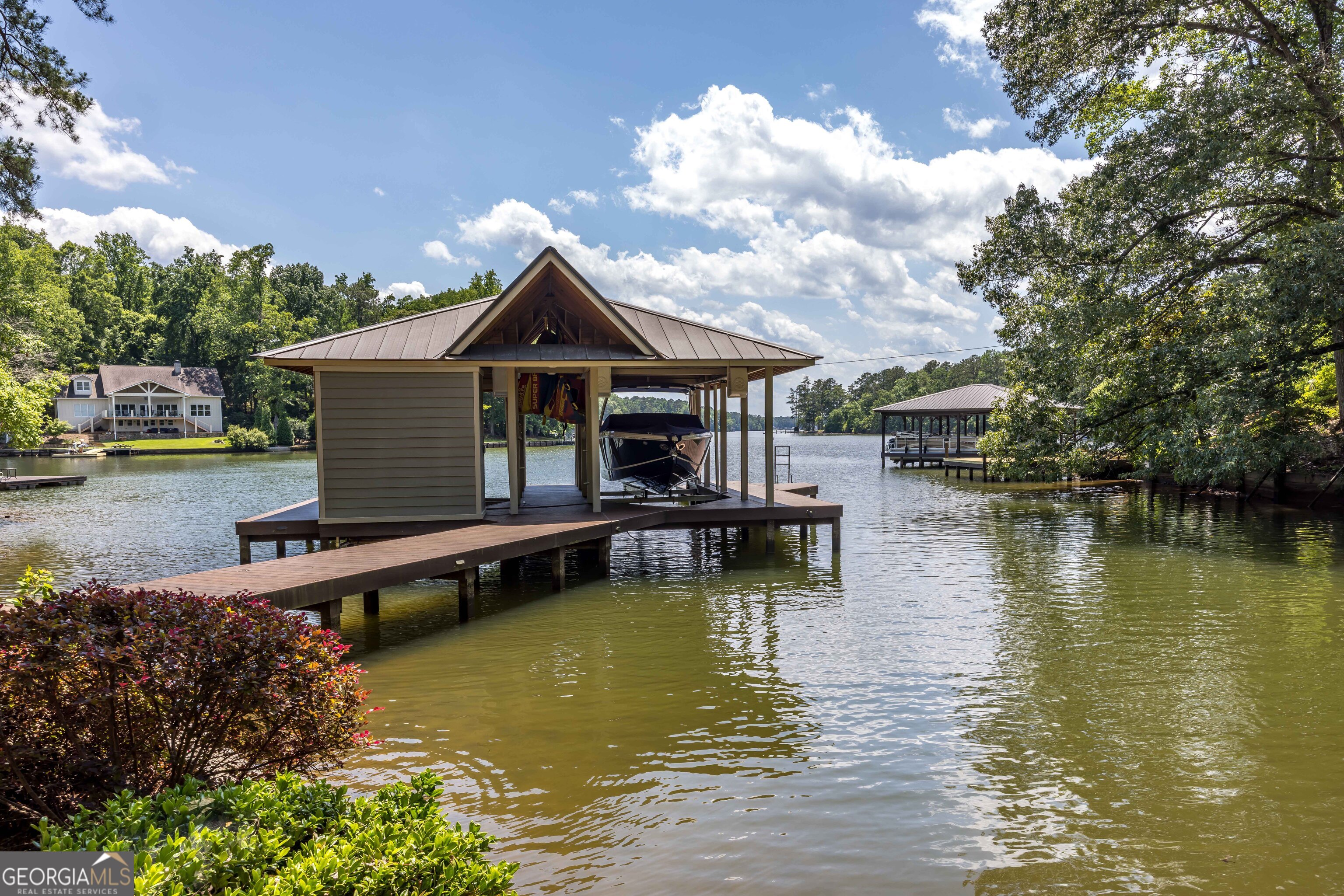 1132 Boat Club Road Hamilton, GA 31811 - Photo 42 of 50 a view of a swimming pool with a patio