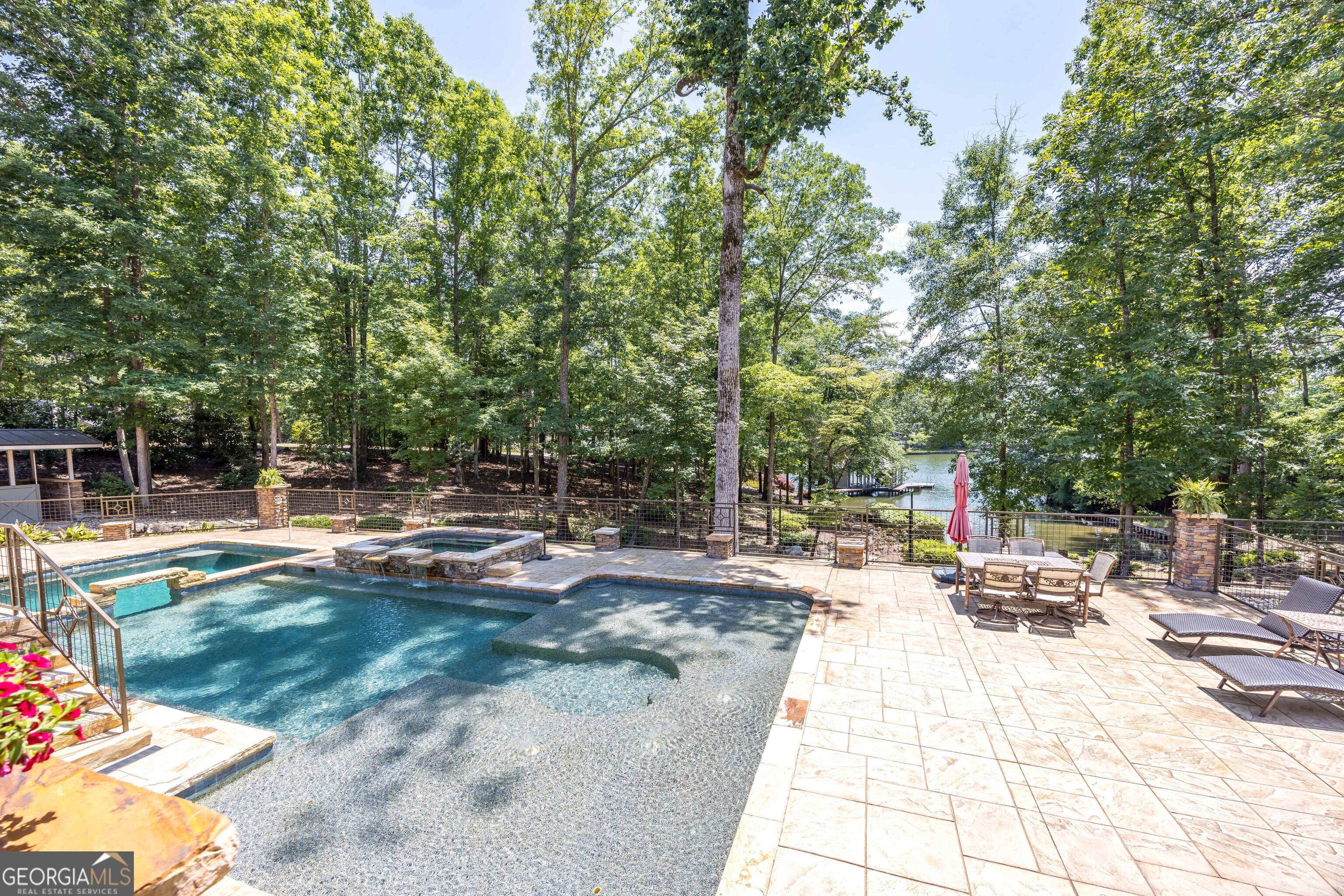 1132 Boat Club Road Hamilton, GA 31811 - Photo 5 of 50 a view of a swimming pool with a patio