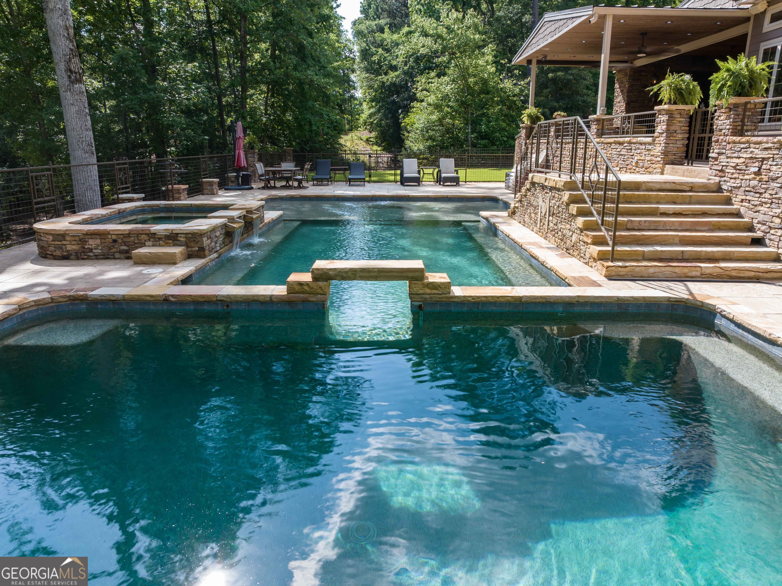 1132 Boat Club Road Hamilton, GA 31811 - Photo 7 of 50 a view of a swimming pool with a patio