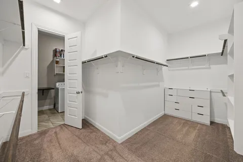 a bathroom with a bathtub and a sink