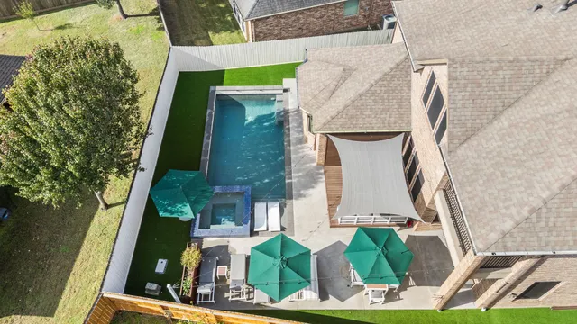 aerial view of houses with yard