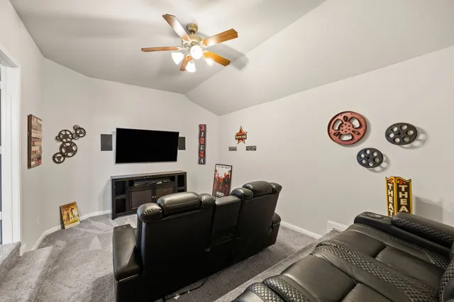 a bed room with a bed and a window