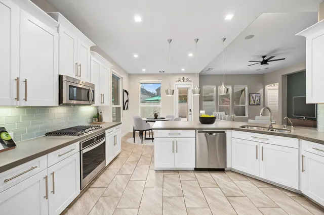 a living room with furniture fireplace and a flat screen tv