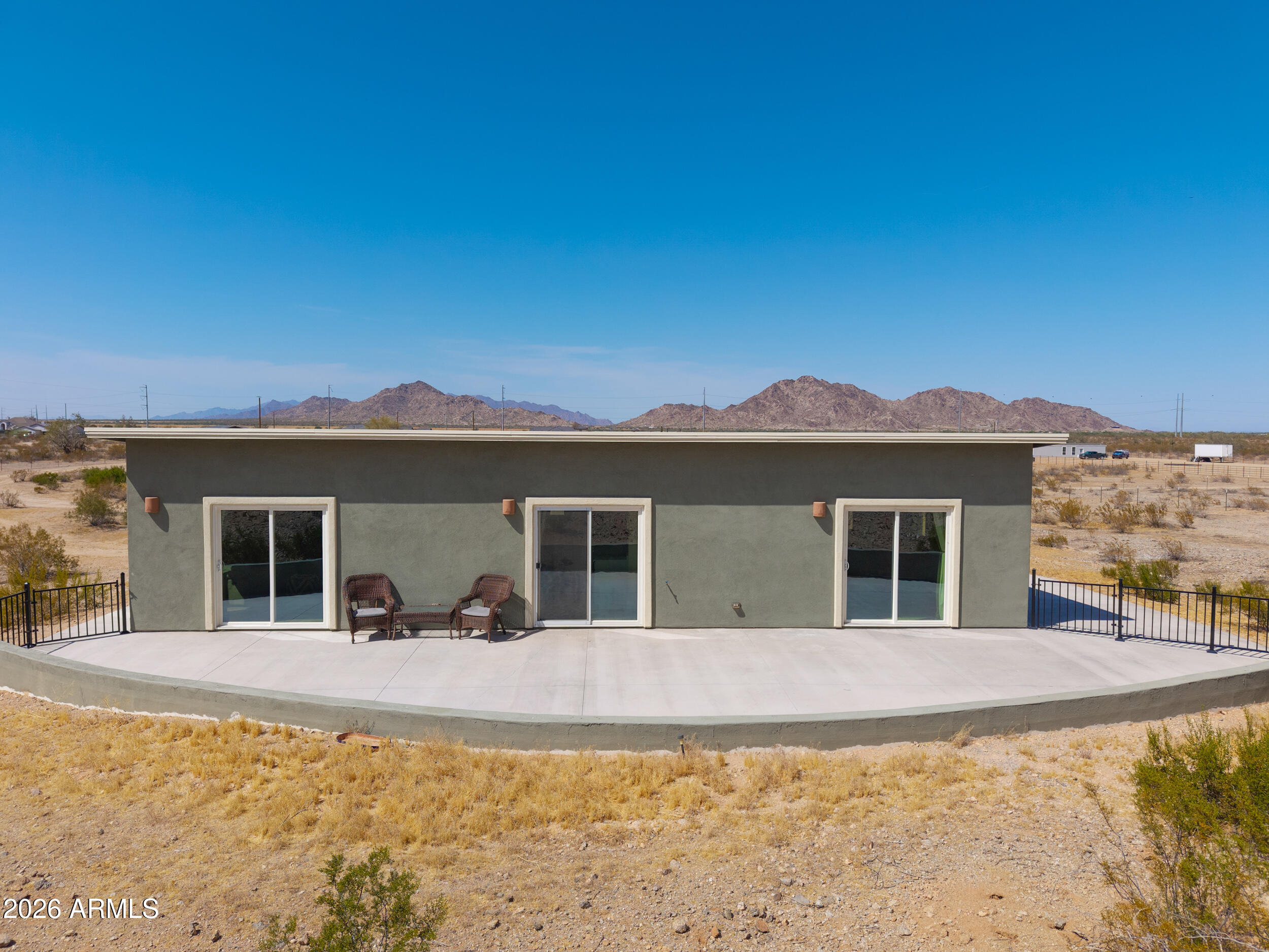 0 West Quail Run Road Maricopa, AZ 85139 - Photo 3 of 49 a view of a house with a backyard