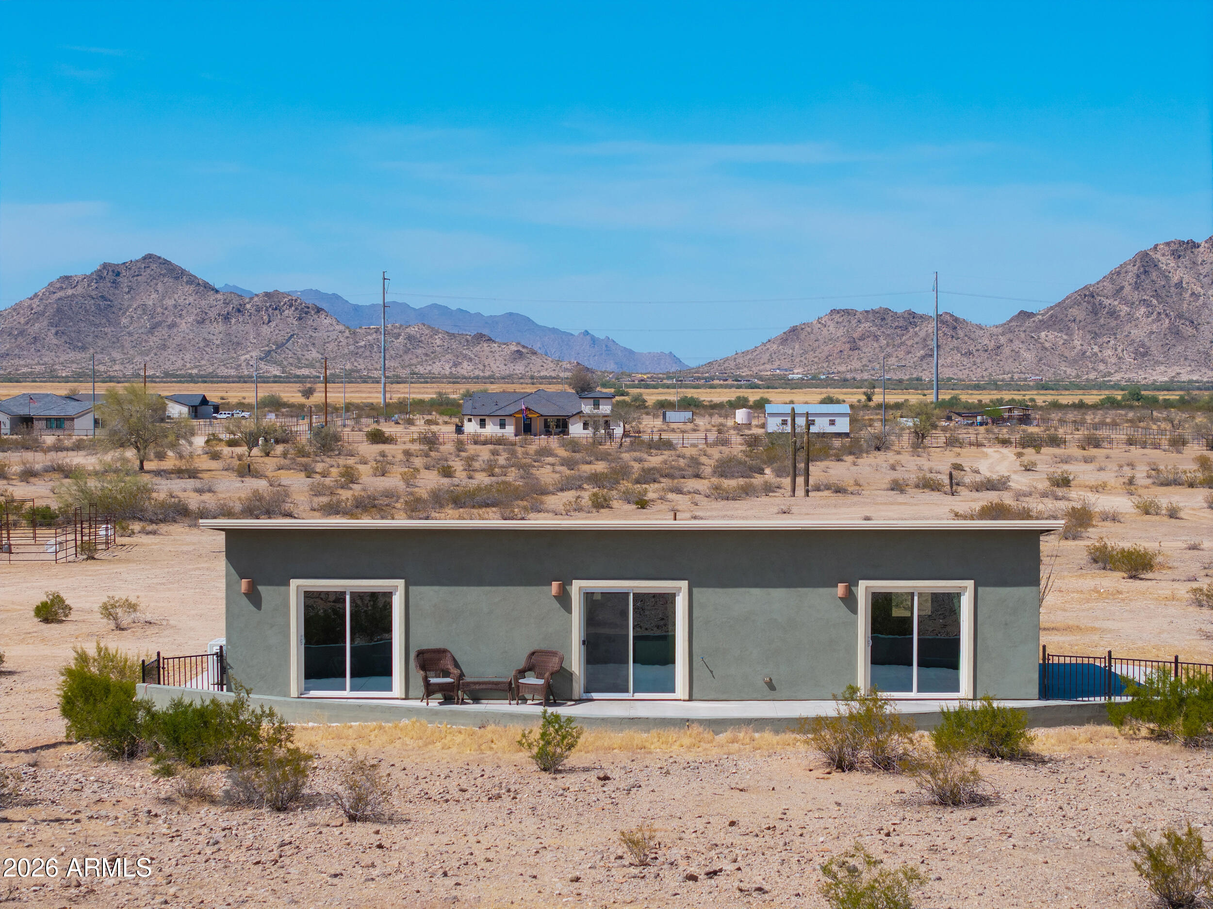 0 West Quail Run Road Maricopa, AZ 85139 - Photo 43 of 49 a front view of a house with a yard