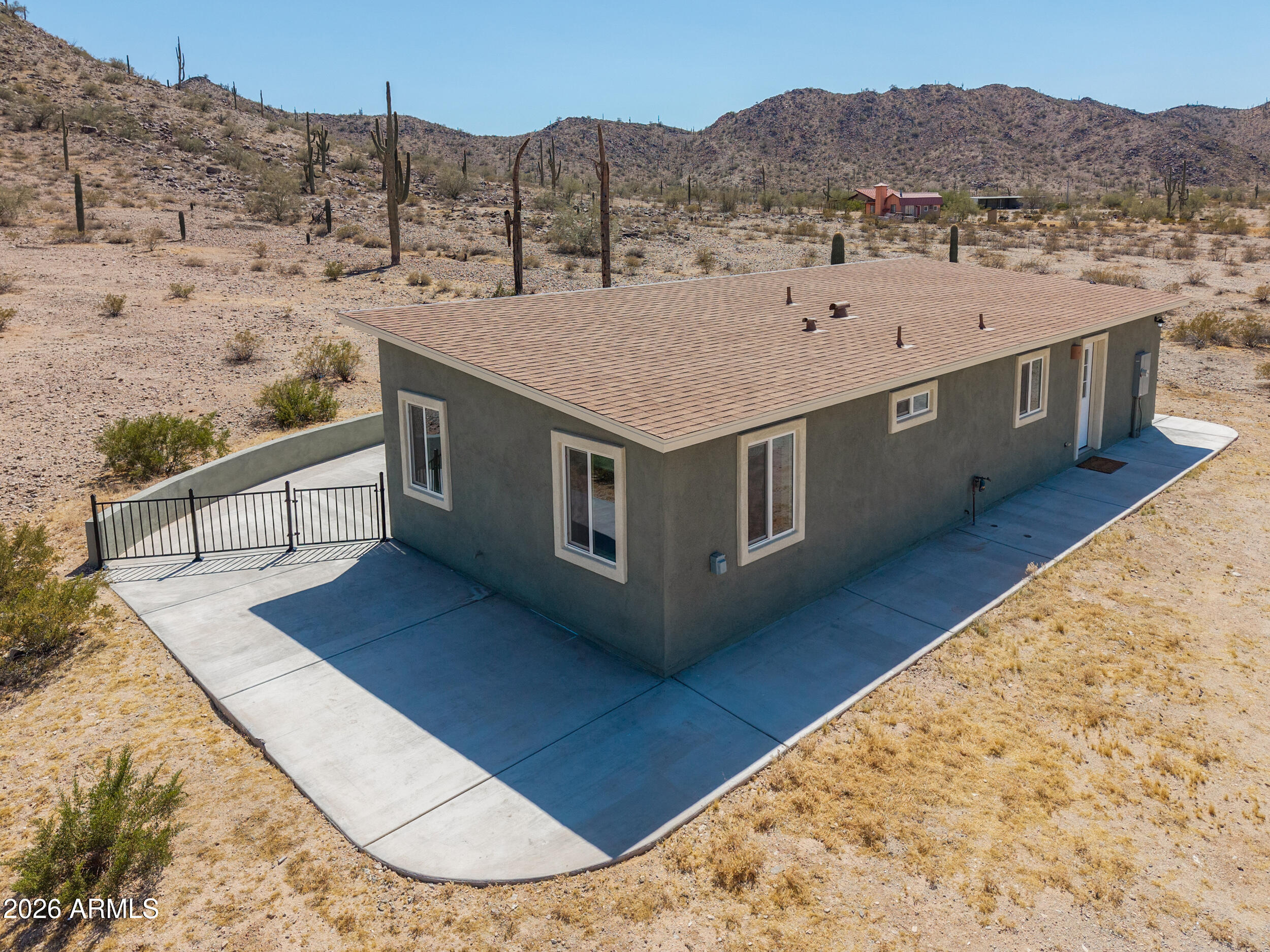 0 West Quail Run Road Maricopa, AZ 85139 - Photo 47 of 49 a view of a house with a mountain