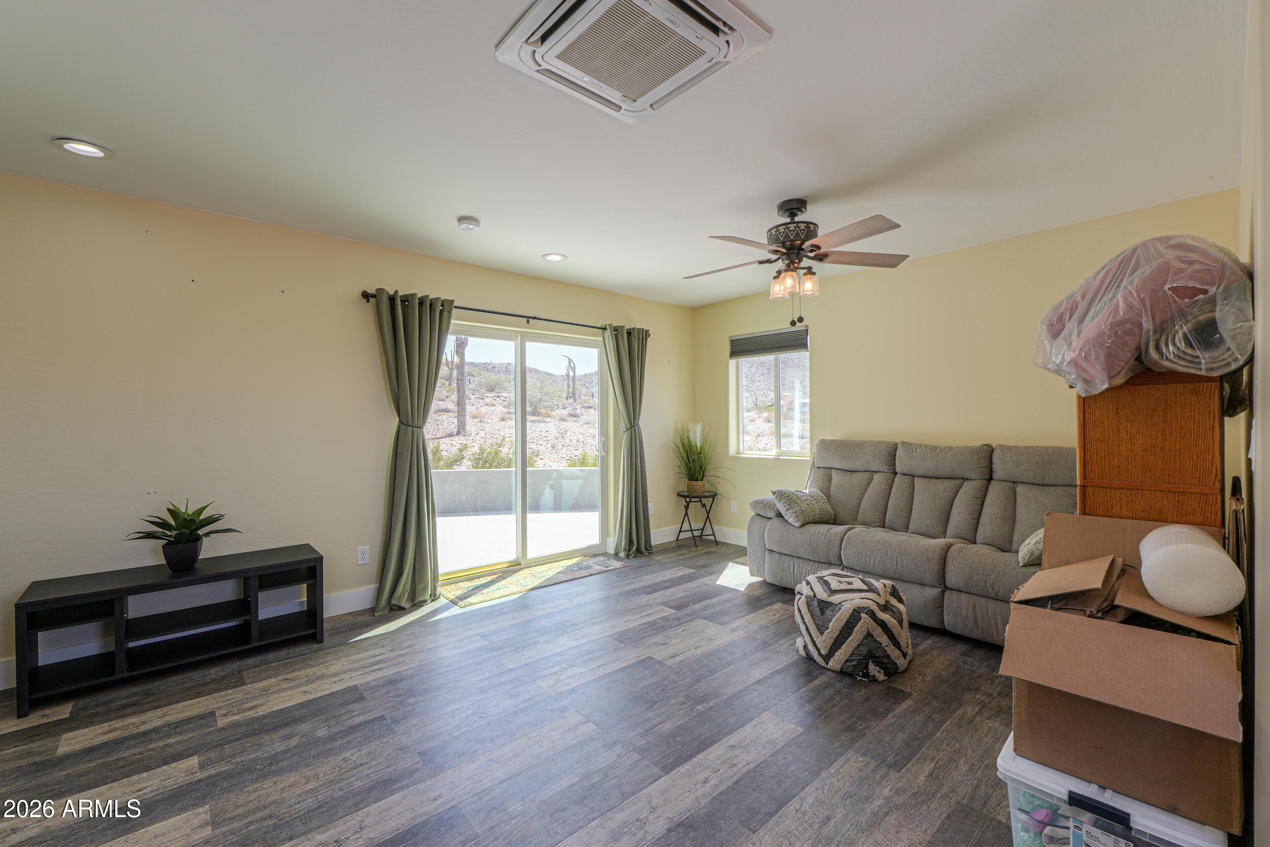 0 West Quail Run Road Maricopa, AZ 85139 - Photo 10 of 49 a living room with furniture and a window