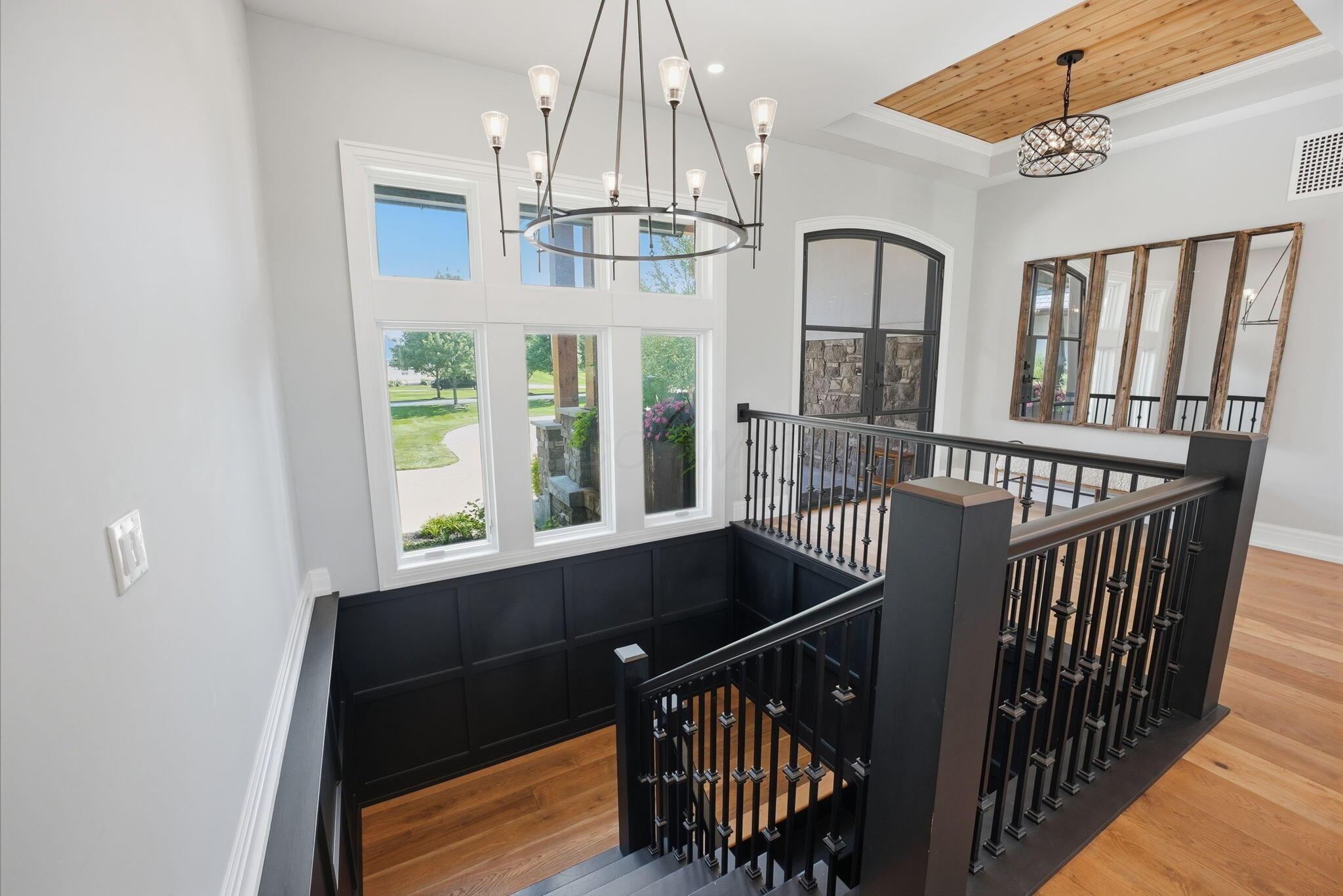10122 Concord Road Dublin, OH 43017 - Photo 33 of 119 Open Staircase to Finished Lower Level