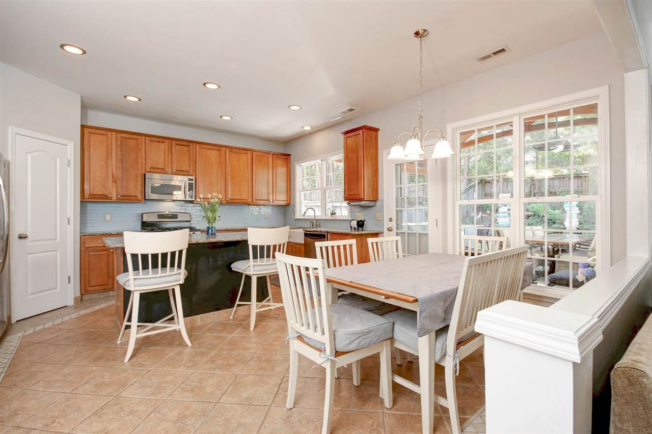 7532 Silver View Lane Raleigh, NC 27613 - Photo 11 of 30 Lots of space to enjoy your morning coffee or take in the view of the amazing backyard. Breakfast Room