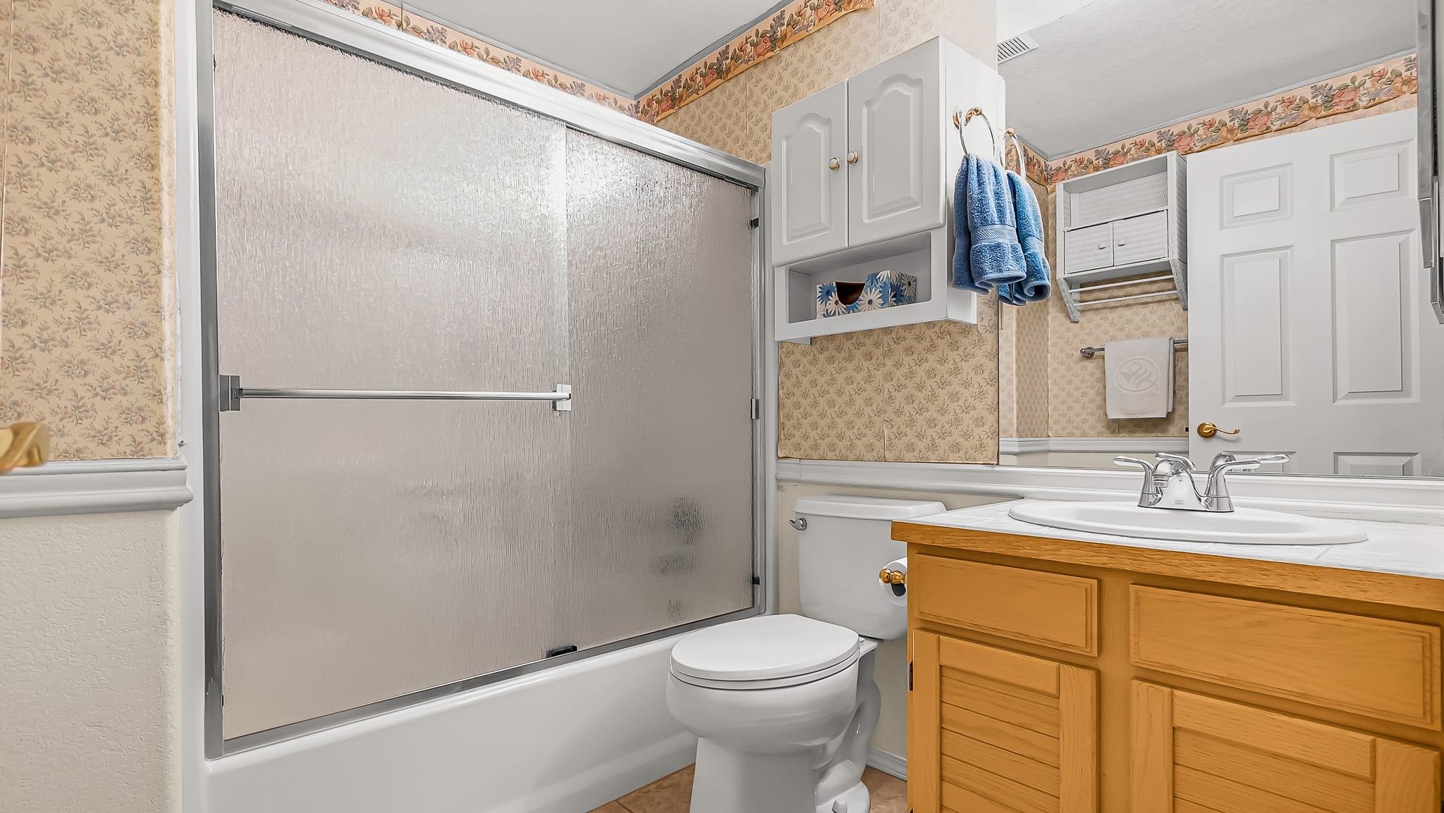 12 West Ridge Court Parachute, CO 81635 - Photo 28 of 37 a bathroom with a sink a toilet and shower