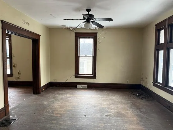 a view of an empty room with a window