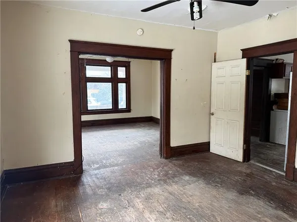 a view of empty room with windows
