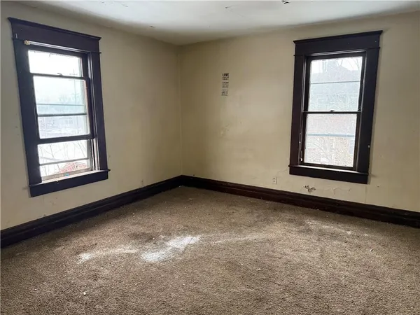 an empty room with a window