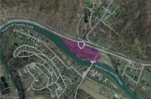 a view of a garden with an outdoor space