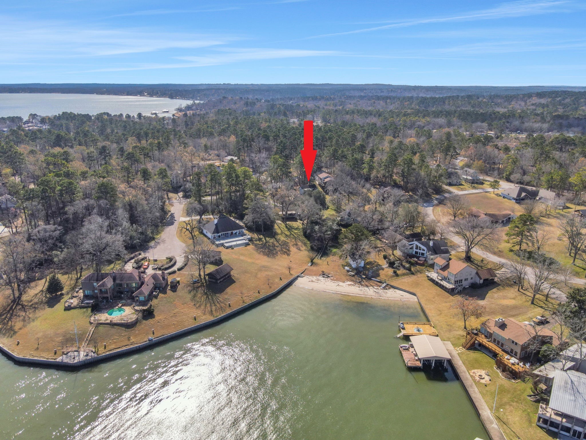 171 Kings Way Coldspring, TX 77331 - Photo 2 of 50 This home, with is peek-a-boo water-view it just a short distance from Lake Livingston