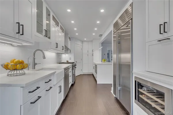 a bathroom with a bathtub and a sink