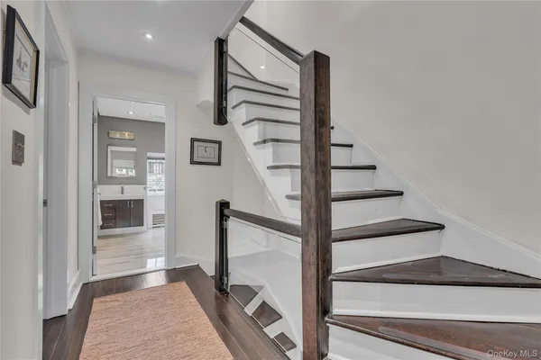a bedroom with a bed and dresser