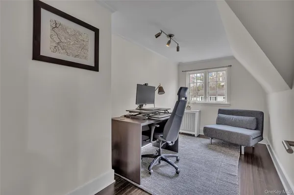 a kitchen with white cabinets