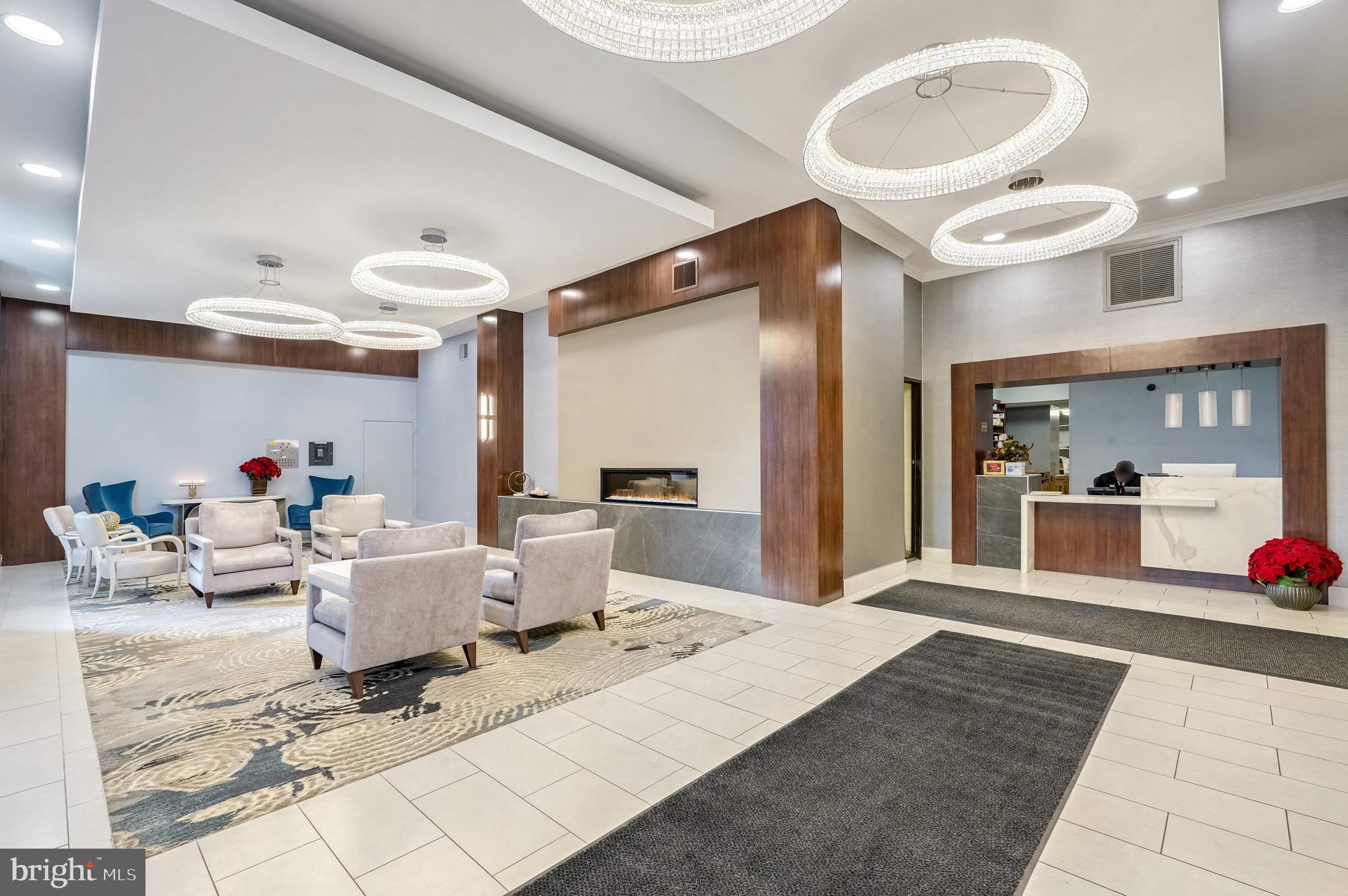 5500 Friendship Boulevard, Unit 1714N Chevy Chase, MD 20815 - Photo 22 of 53 a living room with furniture and a large window