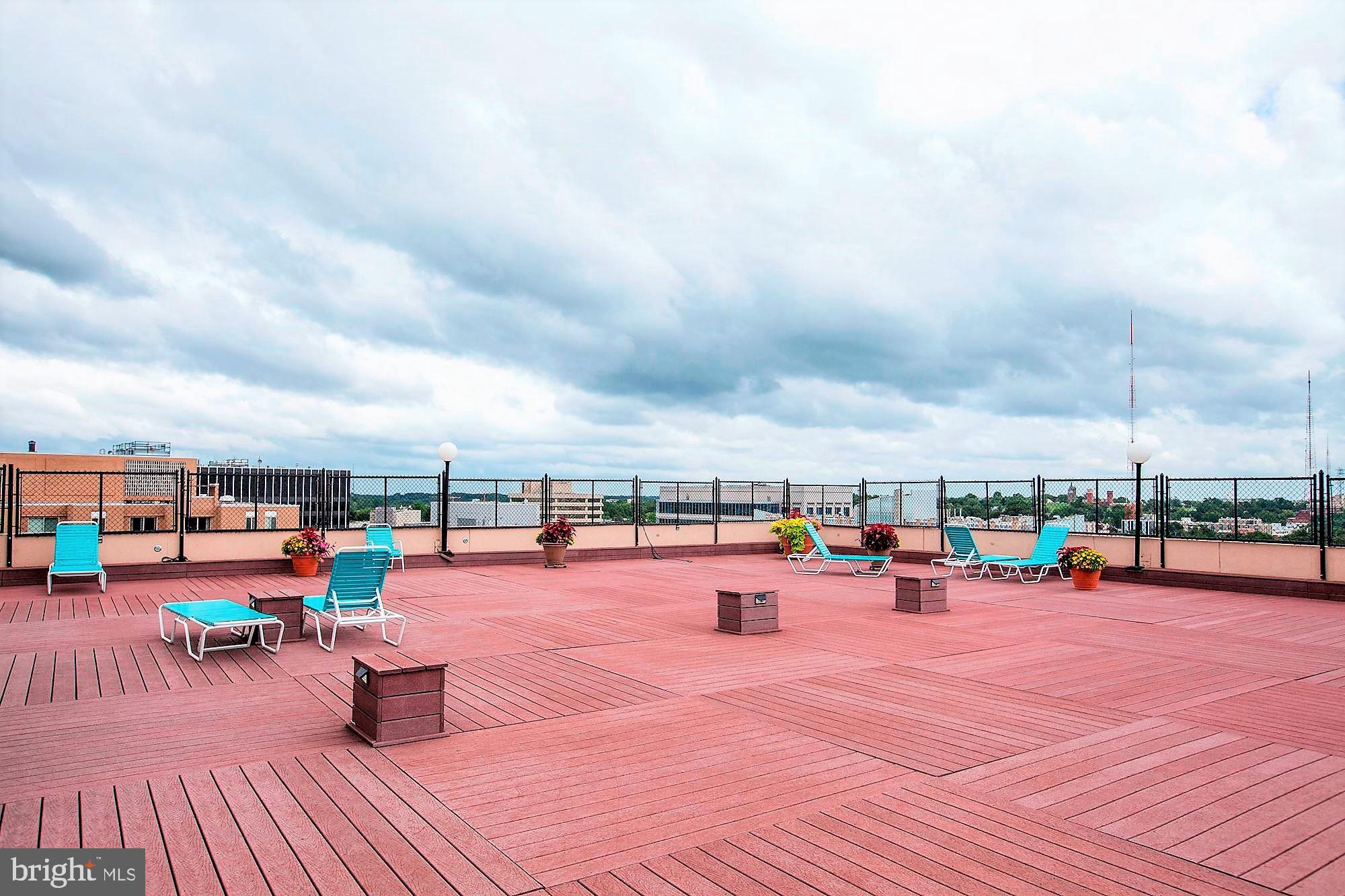 5500 Friendship Boulevard, Unit 1714N Chevy Chase, MD 20815 - Photo 35 of 53 an outdoor space with pool and seating