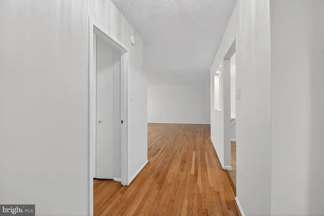 a view of a bathroom from the hallway