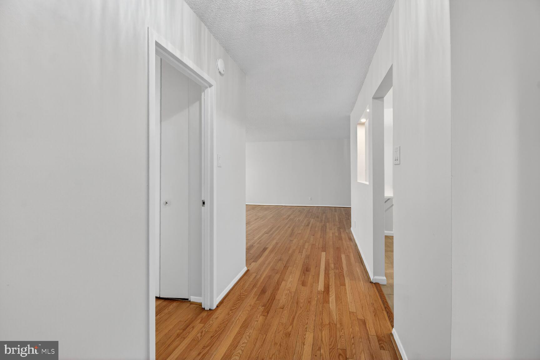 5500 Friendship Boulevard, Unit 1714N Chevy Chase, MD 20815 - Photo 4 of 53 a view of a room with wooden floor