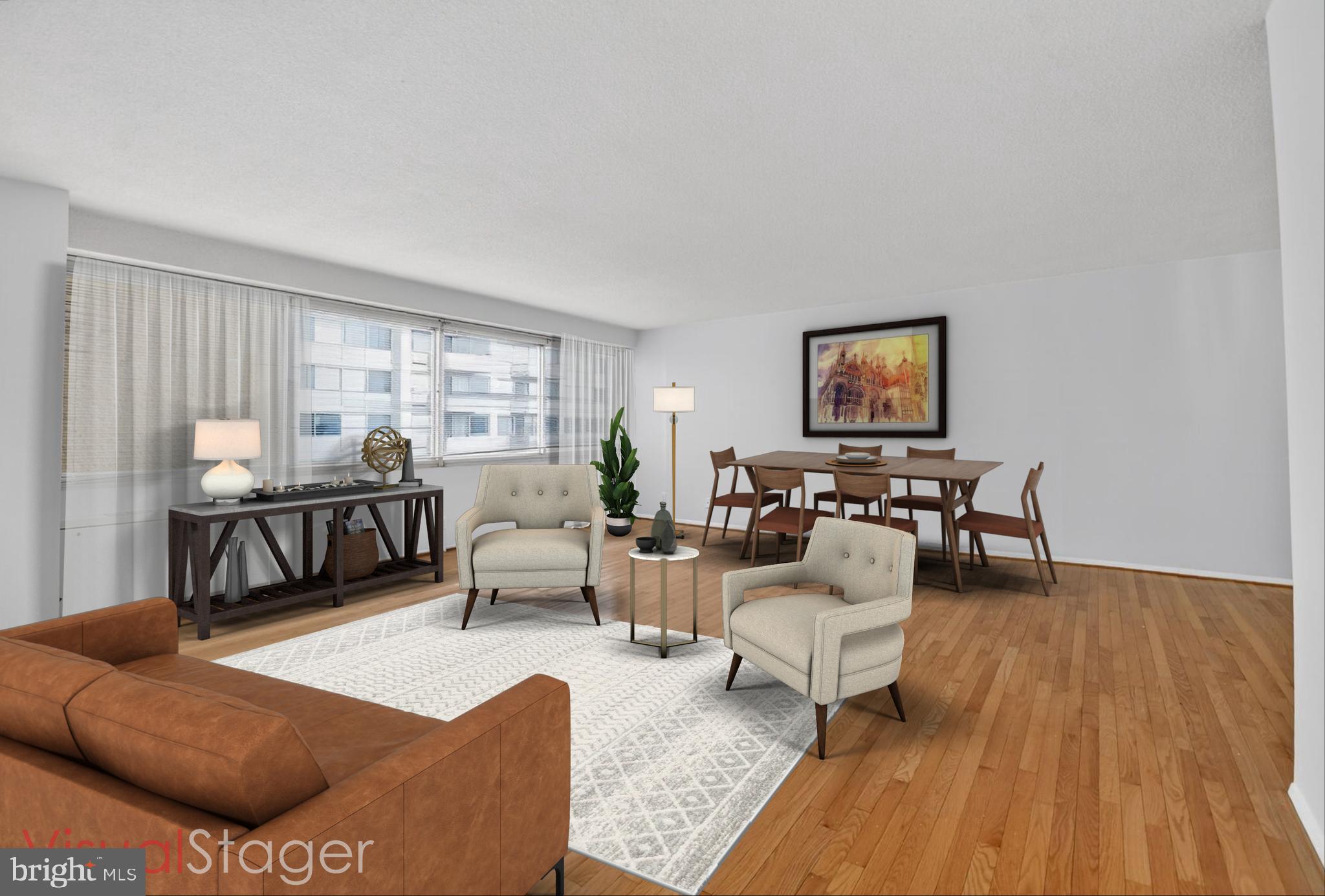 5500 Friendship Boulevard, Unit 1714N Chevy Chase, MD 20815 - Photo 6 of 53 a living room with furniture and a couch
