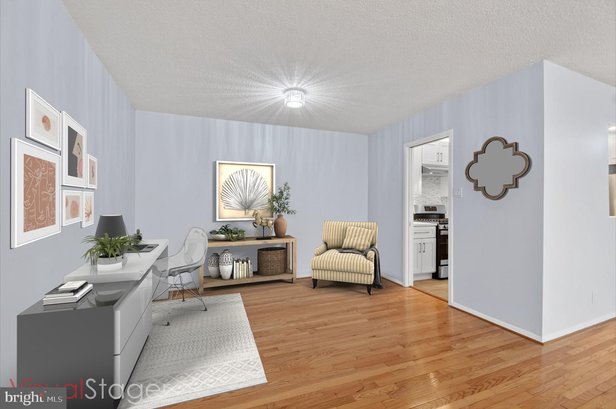 5500 Friendship Boulevard, Unit 1714N Chevy Chase, MD 20815 - Photo 10 of 53 a living room with furniture and a window