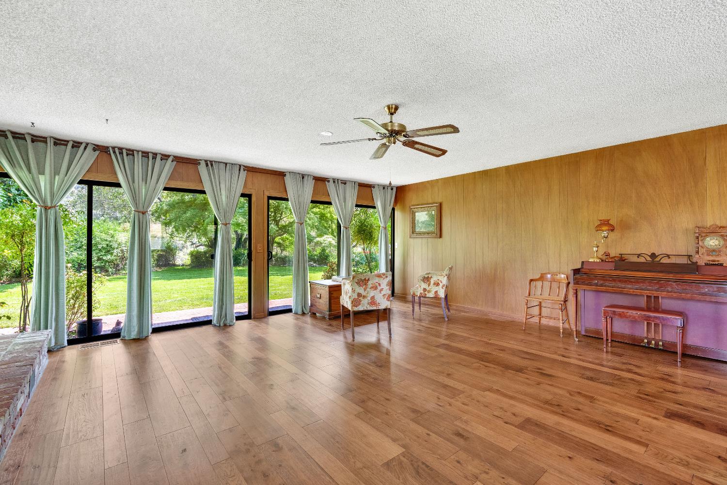43715 Dinely Drive Three Rivers, CA 93271 - Photo 32 of 51 a view of an empty room with wooden floor and a window