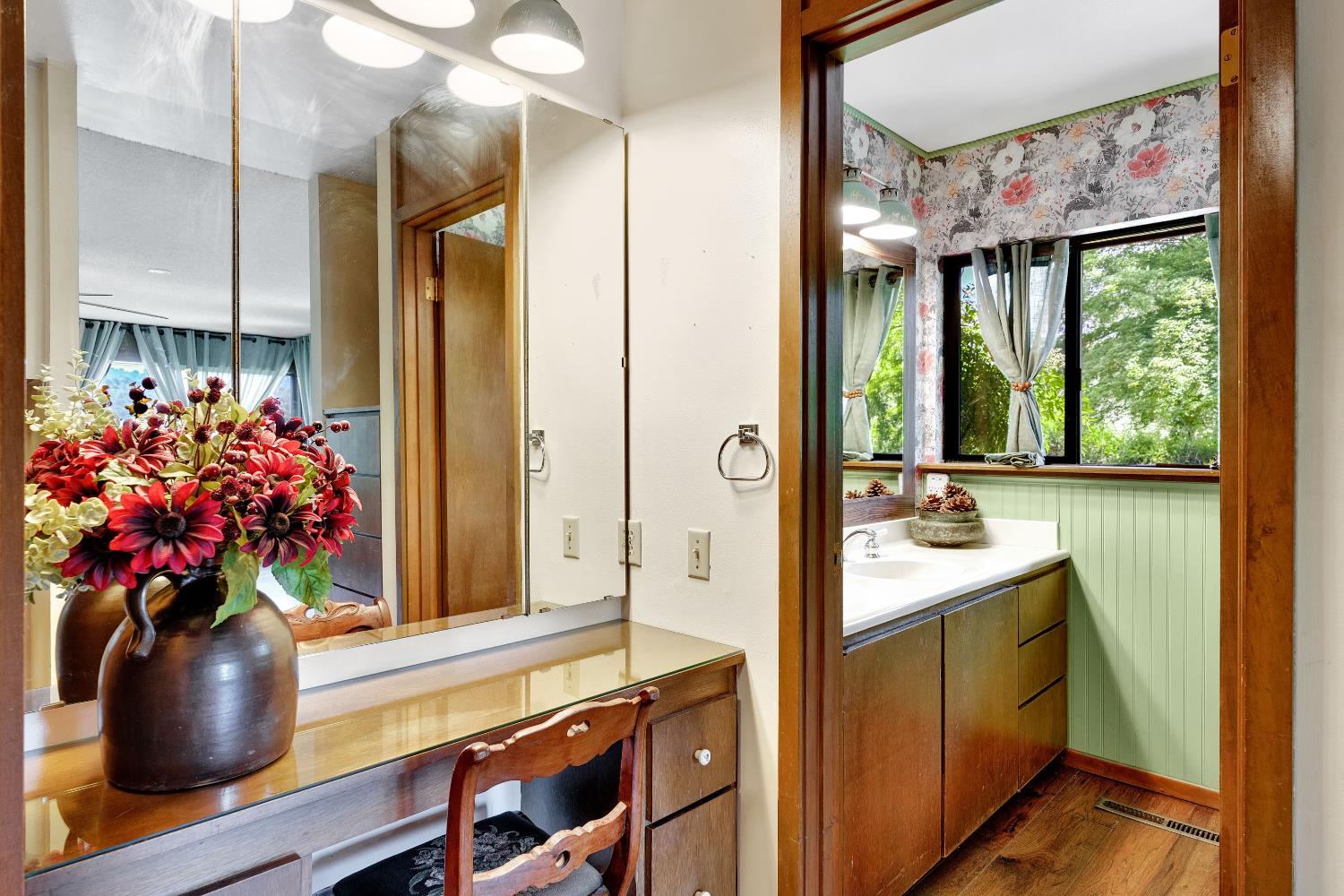 43715 Dinely Drive Three Rivers, CA 93271 - Photo 45 of 51 a bathroom with a sink a large mirror and a shower