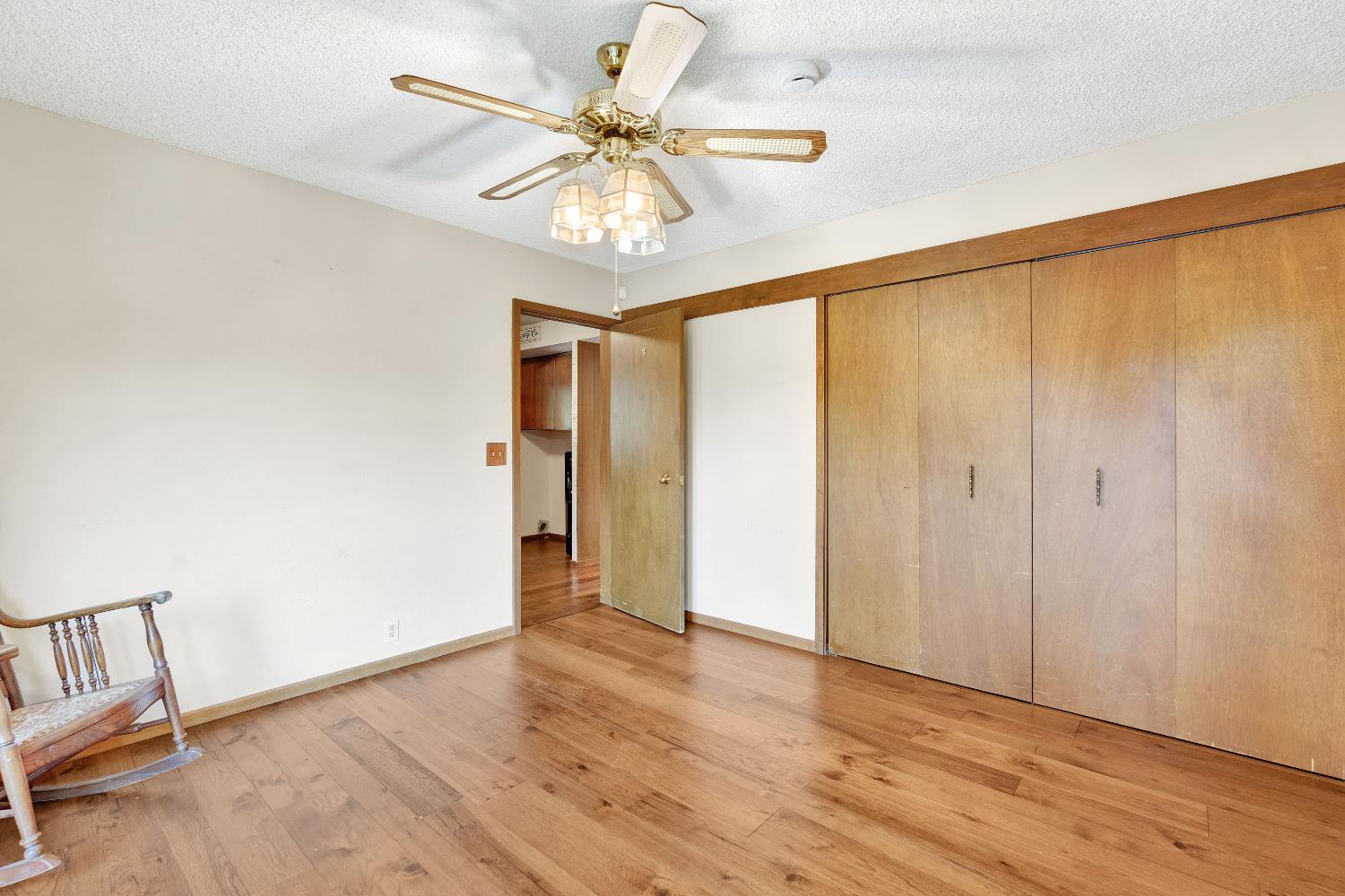 43715 Dinely Drive Three Rivers, CA 93271 - Photo 49 of 51 wooden floor in an empty room with a window