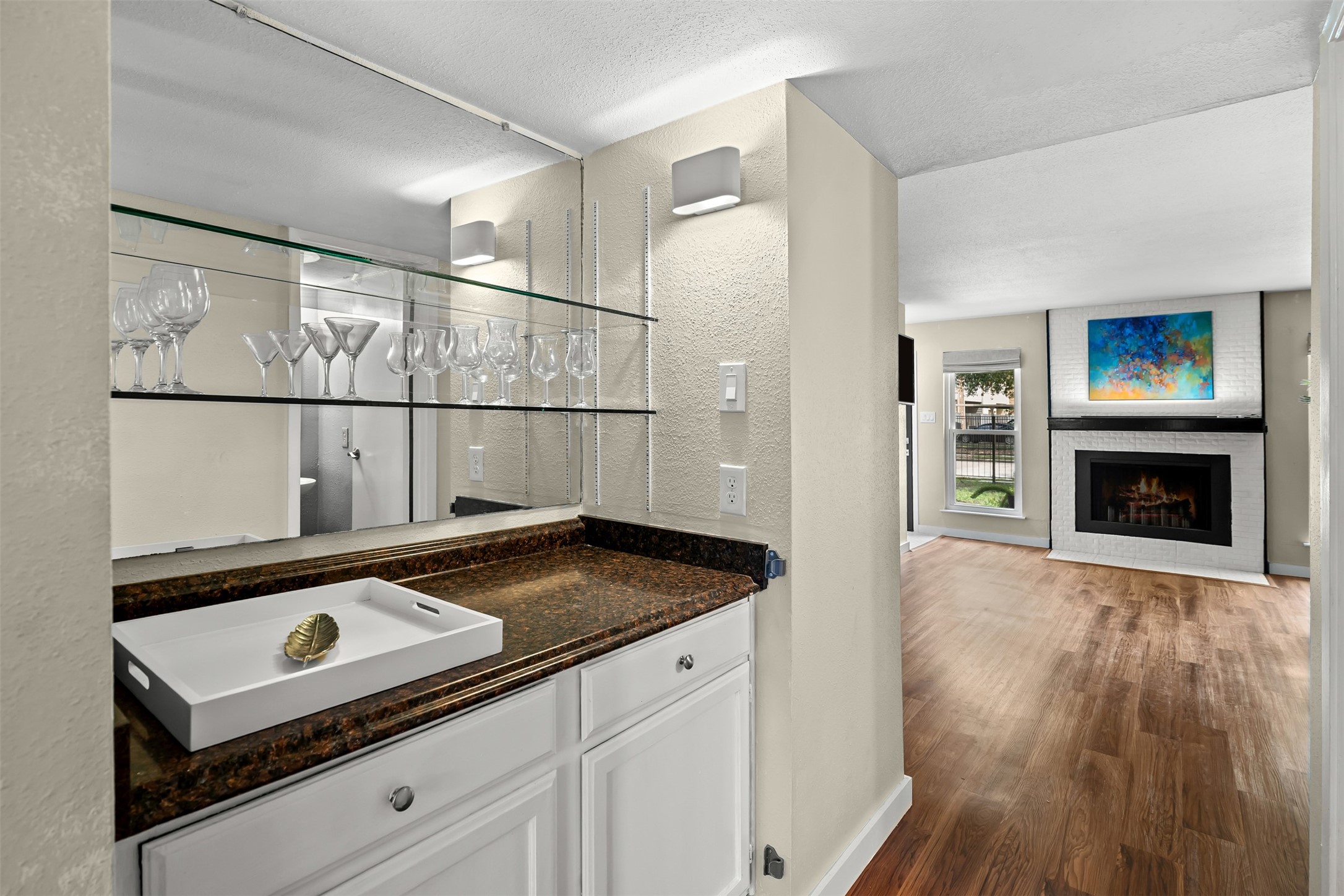 1500 Sandy Springs Road, Unit 22 Houston, TX 77042 - Photo 6 of 31 The bar area is conveniently situated between the living room and the kitchen making entertaining a breeze.