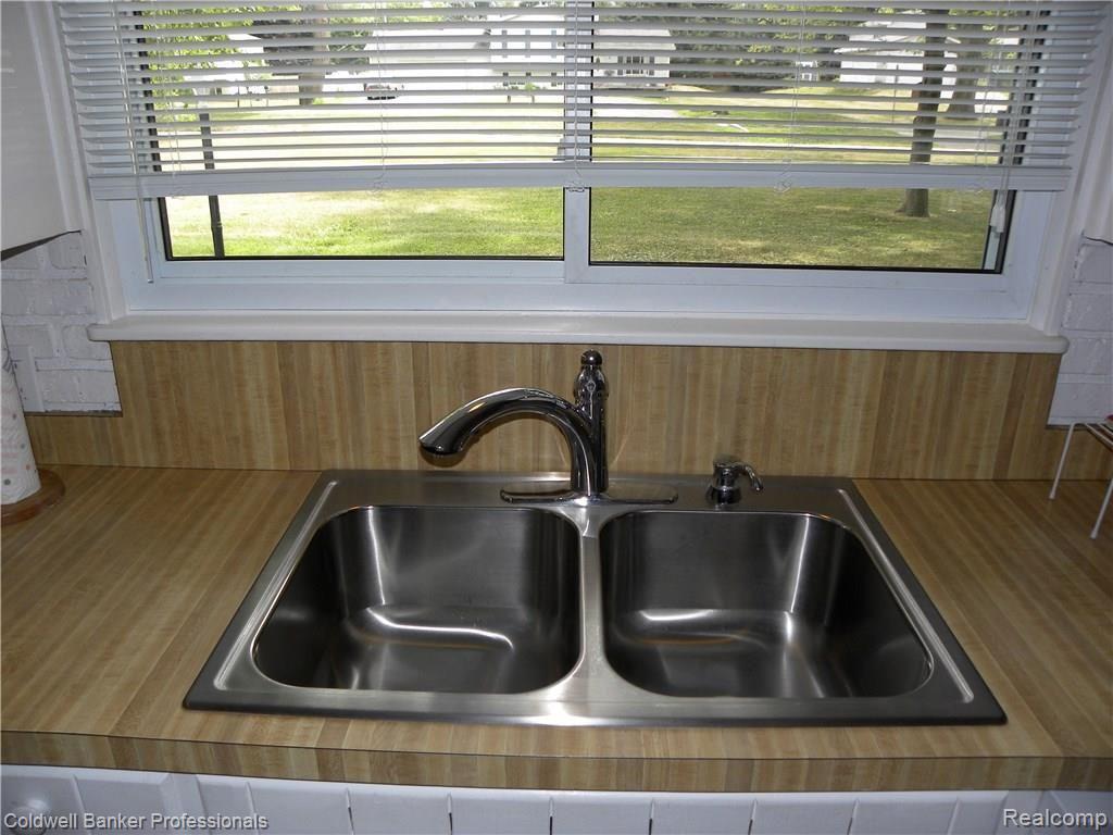6565 Walters Road Clarkston, MI 48346 - Photo 31 of 40 Shiny and new stainless steel sink