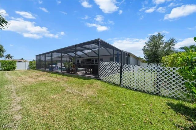 a view of a wrought iron fences in front of house